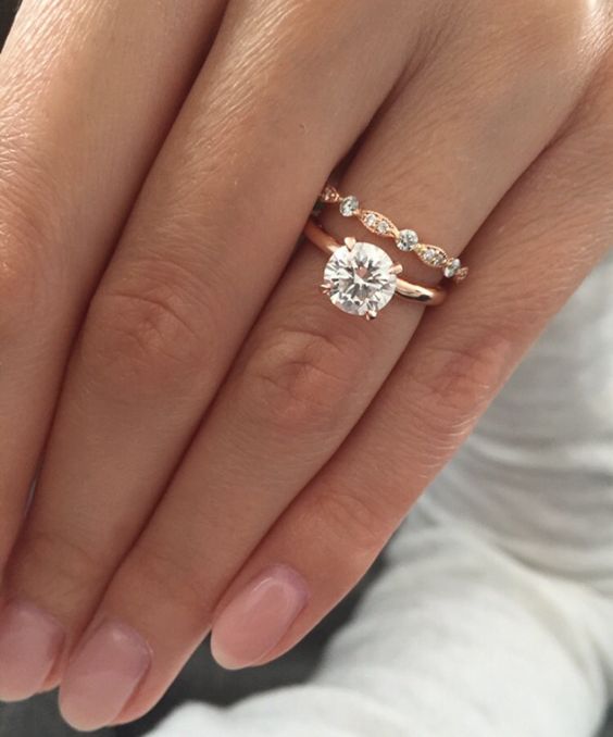 Rose gold solitaire engagement ring with Art Deco wedding band