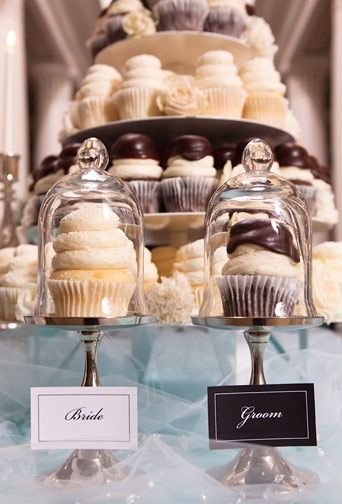 Fun and beautiful Cupcake tower with brides choice and grooms choice