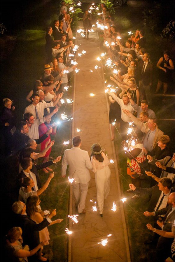 Rustic Spring Texas wedding sparklers Photo by The Nichols