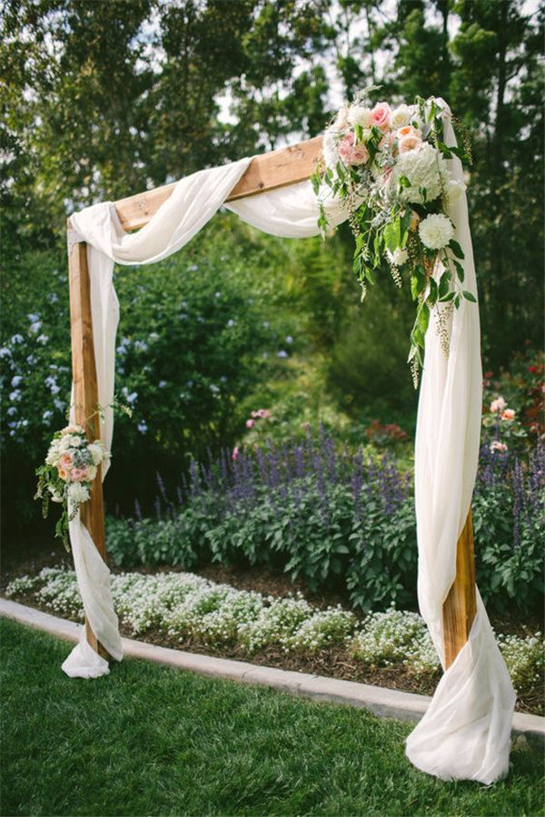 Romantic backyard wedding arch ideas photo via VisPhotography