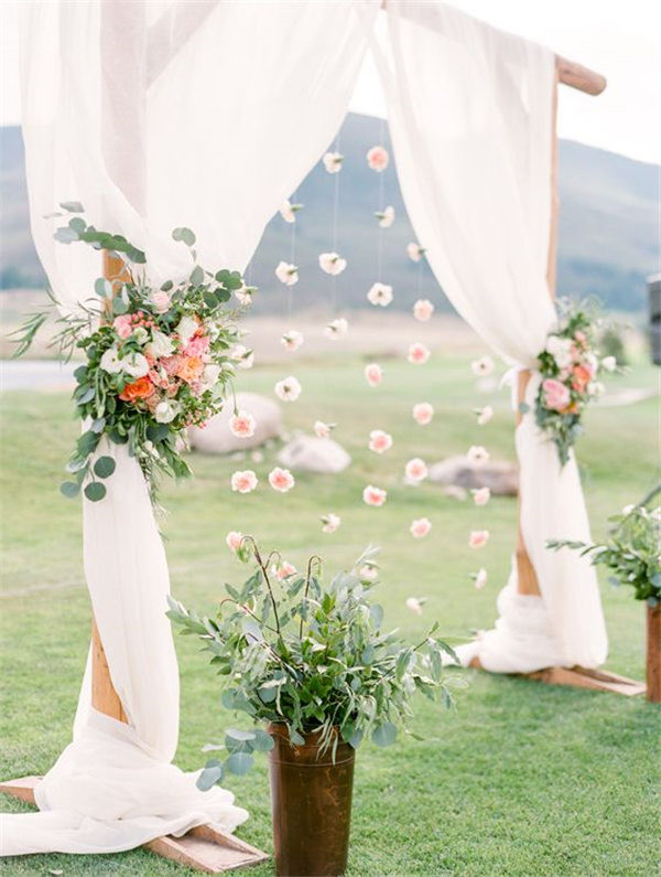 Spring flowers and greenery Outdoor Pastel Keystone Colorado wedding arch ideas