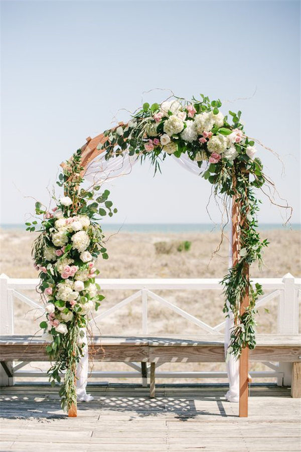 gorgeous floral ceremony arch via Britt Croft