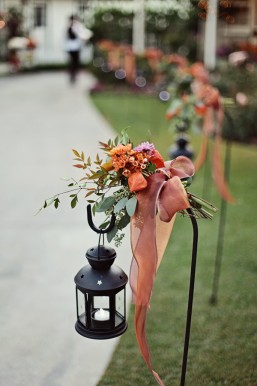 CEREMONY AND RECEPTION shepard hooks with lamps flowers orange and purple