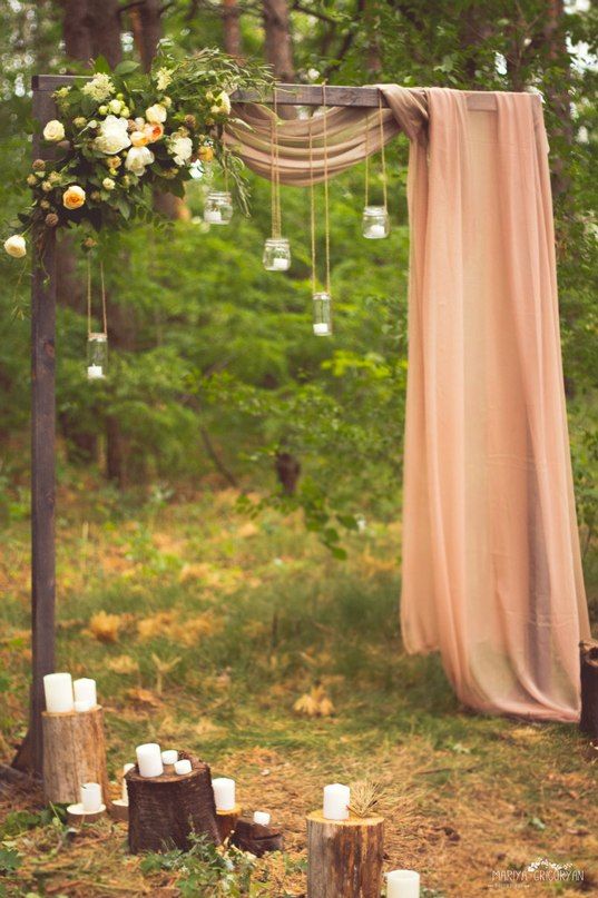 Arch and altar decor for outdoor boho wedding ceremony