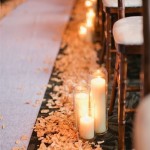 Candles with rose petals for ceremony.