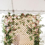 Dreamy floral lattice backdrop by Bows + Arrows for the wedding