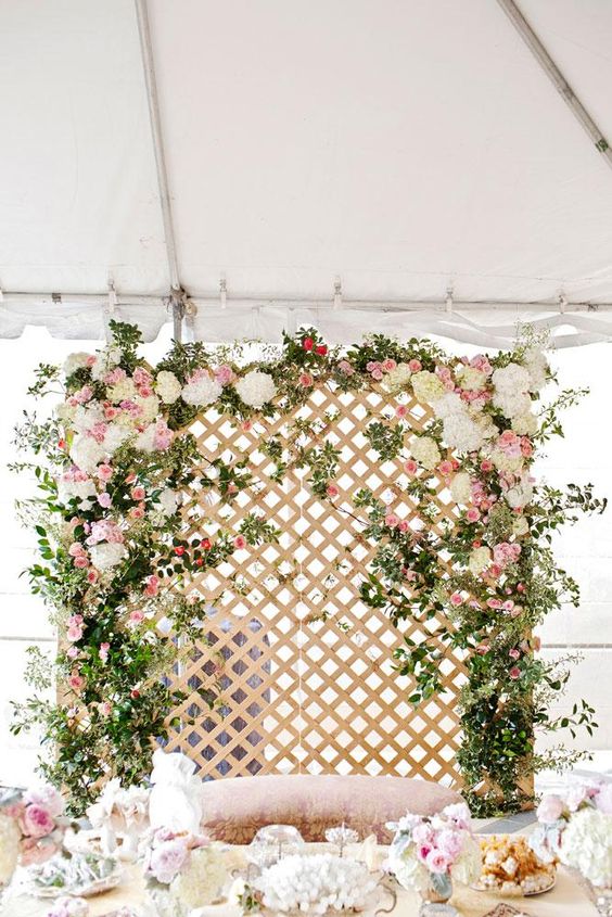 Dreamy floral lattice backdrop by Bows + Arrows for the wedding