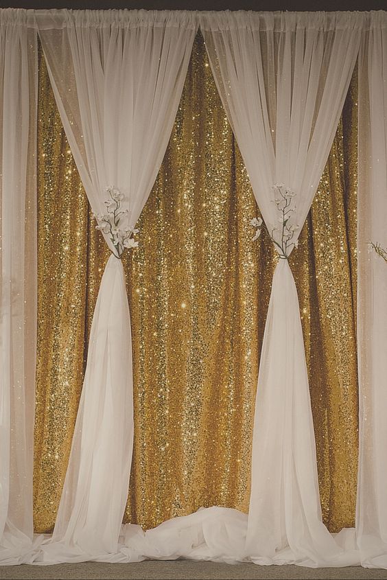 Gold sequin curtain becomes soft and romantic when you create this beautiful two layer backdrop