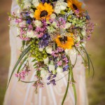 Rustic cascading wedding bouquet farmhouse wedding with beautiful sunflowers