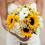 Sunflower wedding bouquet with white gerbera daisies and white roses
