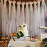 We Love This Tulle Wedding Backdrop elegant and this use is original and perfect for weddings