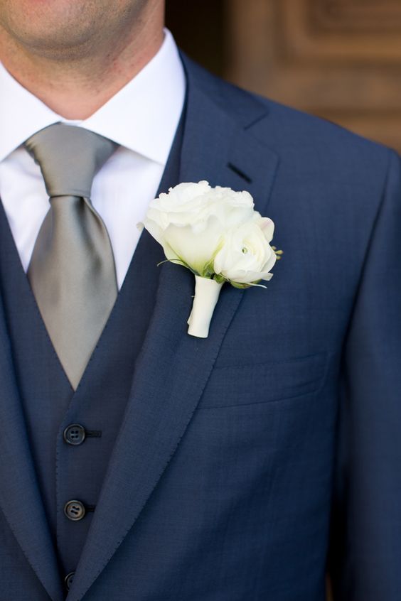 Groom in Navy Suit photography by Amyandjordan
