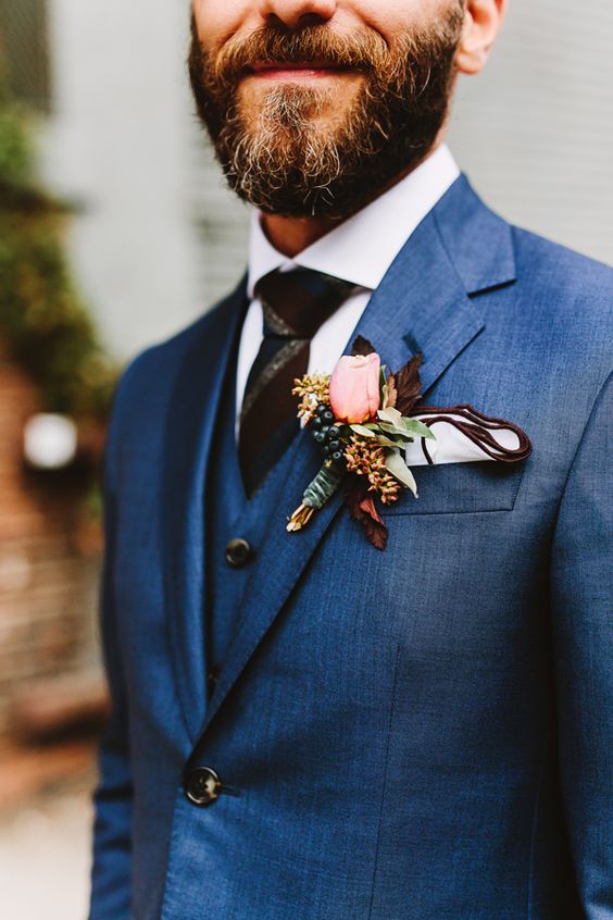 Groom suit with boutonniere - photo by Pat Furey