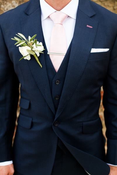 Navy and light pink groom attire