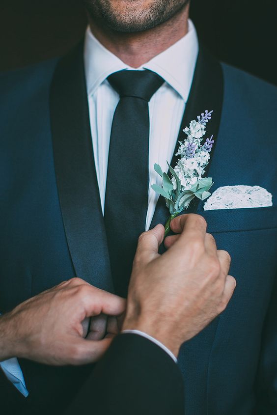 Navy groom suit with lavender boutonniere by Fiona + Bobby