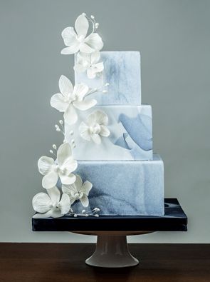 Sugar flowers and grey marble wedding cake