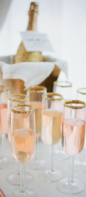 Add gold sugar to the trim of your champagne glasses