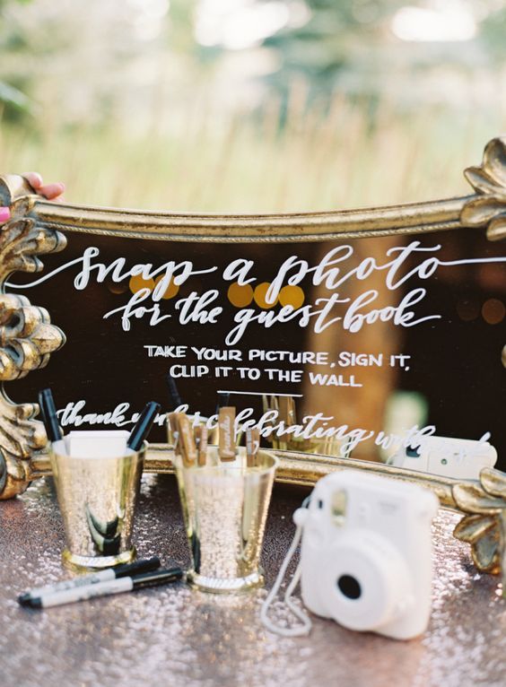 Polaroid guest book and mirror sign ideas by Carrie King