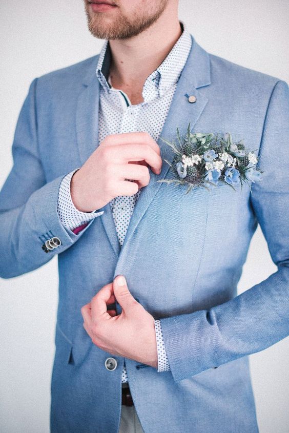 Dusty blue and green boutonniere