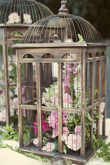 beautifully designed metal birdcage wedding centerpieces