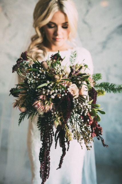 elegant giant botanical winter wedding bouquet