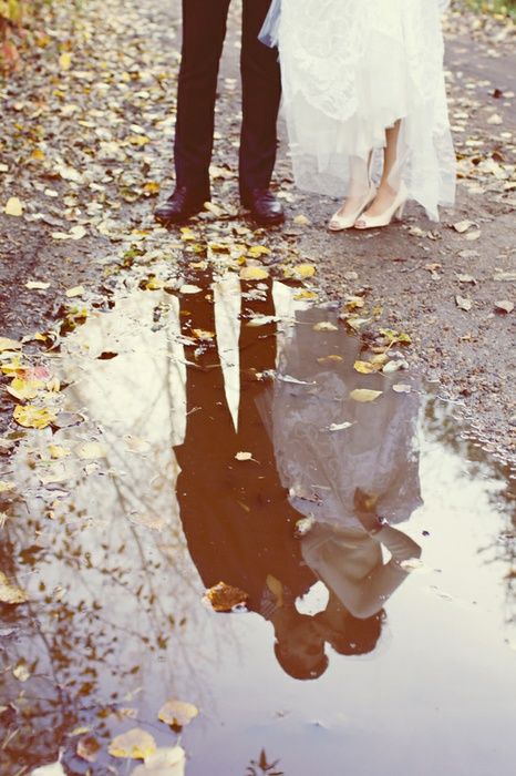 creative fall wedding photo in a rain