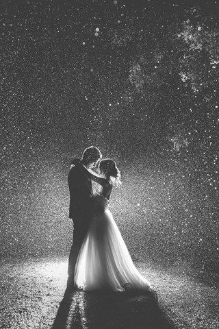 elegant wedding photo in the rain