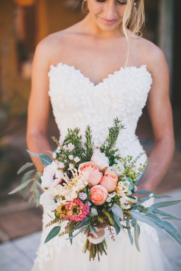 white wedding dress and tropical bouquet for tuscany wedding