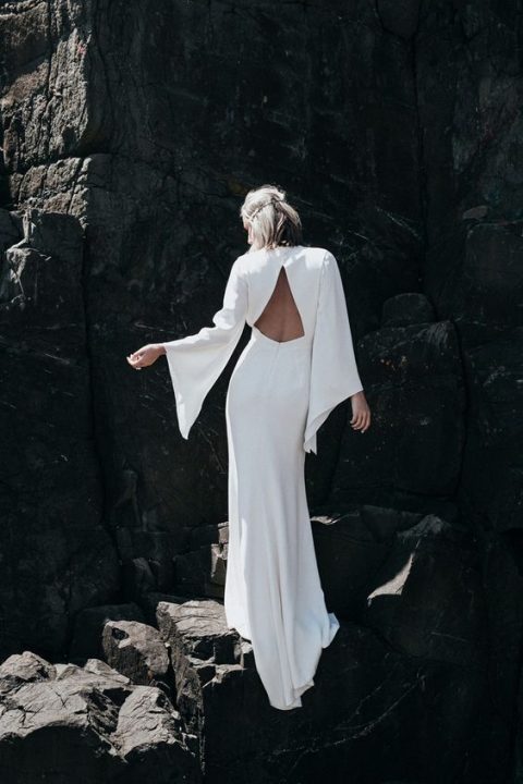 off the shoulder bell sleeve wedidng dress for a beach boho bride
