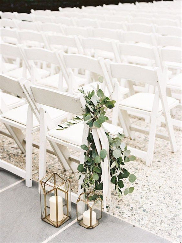 Lantern aisle decor, greenery