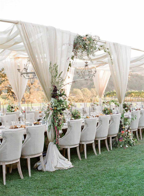 outdoor tent wedding with drapes