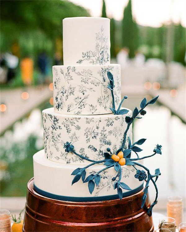 Timeless White and Blue Wedding Cakes with Painted Designs