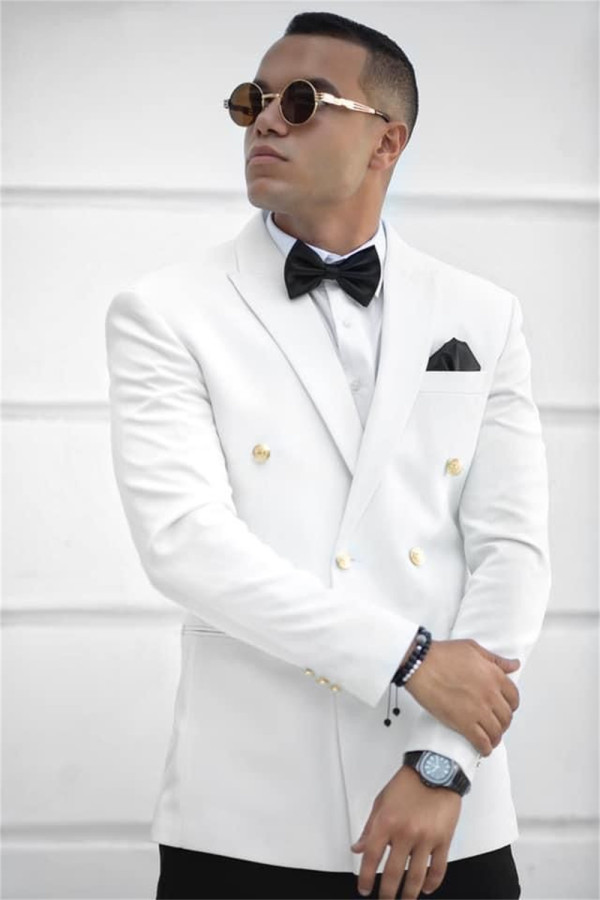  A groom in a double-breasted white suit