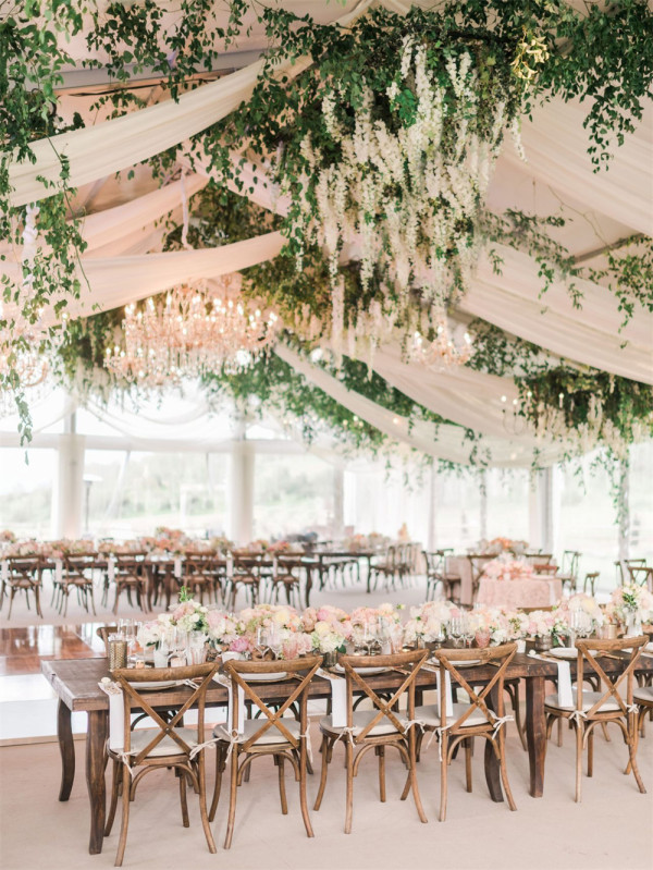 Outdoor tent wedding with Floral Arrangements
