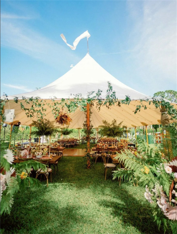 intriguing outdoor tent wedding with landscaping